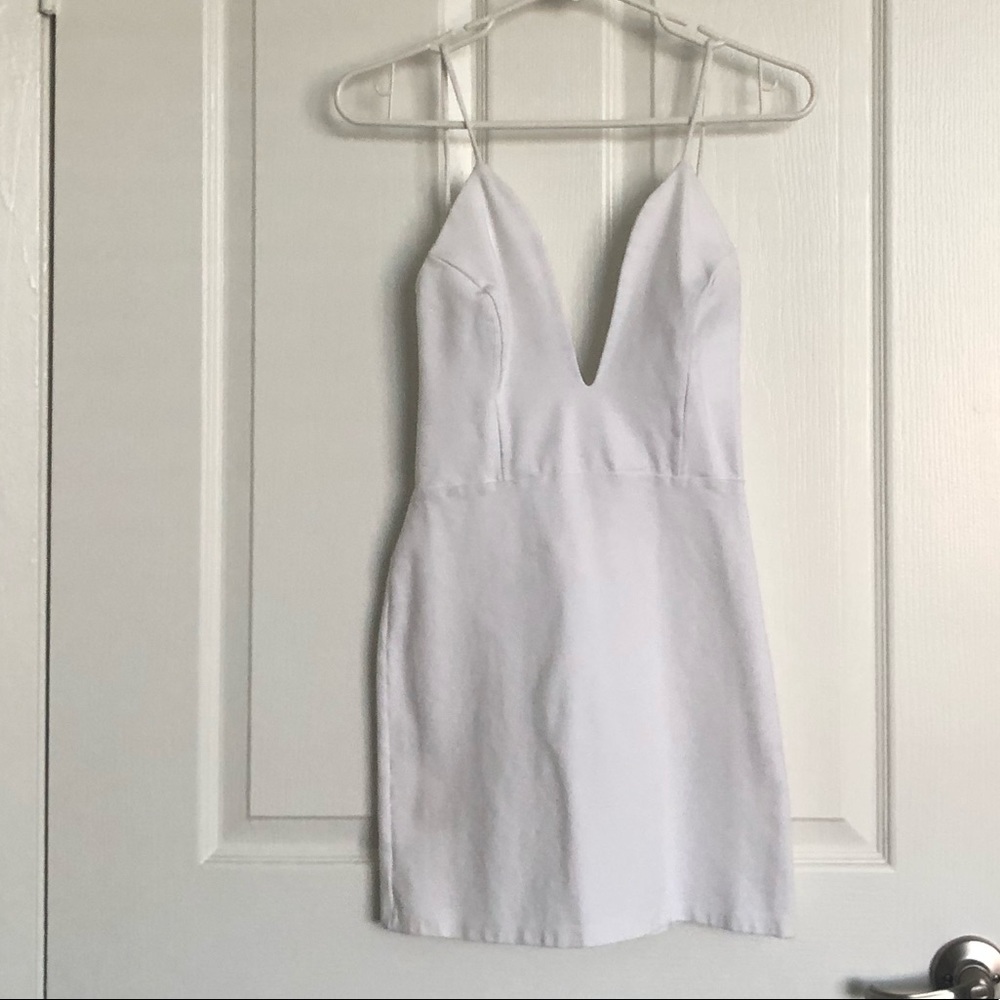 White low plunged backless dress